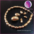 rice shape brass bead brass spacer beads natural brass color barrel beads